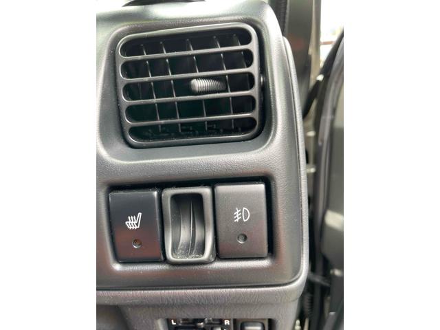 ジムニー ランドベンチャー　４ＷＤ　ナビ　キーレスエントリー　電動格納ミラー　シートヒーター　ＡＴ　ＡＢＳ　ＣＤ　ＭＤ　革シート　ルーフレール　アルミホイール　衝突安全ボディ　エアコン　パワーウィンドウ（4枚目）