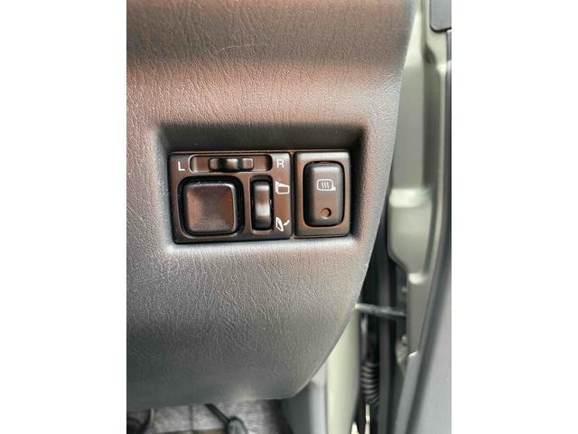 ジムニー ランドベンチャー　４ＷＤ　ナビ　キーレスエントリー　電動格納ミラー　シートヒーター　ＡＴ　ＡＢＳ　ＣＤ　ＭＤ　革シート　ルーフレール　アルミホイール　衝突安全ボディ　エアコン　パワーウィンドウ（5枚目）