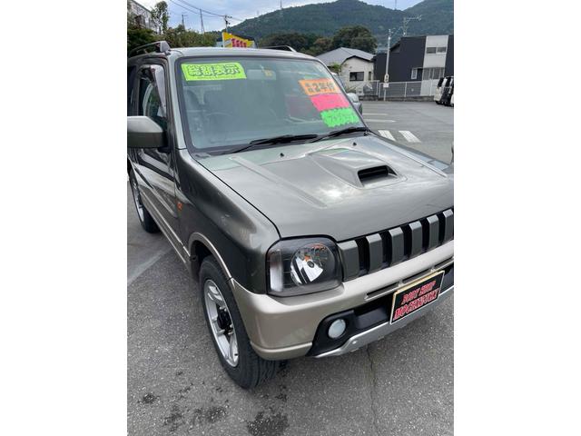 ジムニー ランドベンチャー　４ＷＤ　ナビ　キーレスエントリー　電動格納ミラー　シートヒーター　ＡＴ　ＡＢＳ　ＣＤ　ＭＤ　革シート　ルーフレール　アルミホイール　衝突安全ボディ　エアコン　パワーウィンドウ（12枚目）