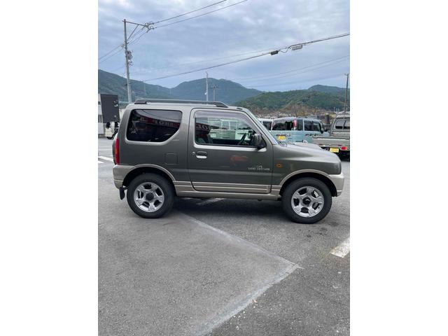 ジムニー ランドベンチャー　４ＷＤ　ナビ　キーレスエントリー　電動格納ミラー　シートヒーター　ＡＴ　ＡＢＳ　ＣＤ　ＭＤ　革シート　ルーフレール　アルミホイール　衝突安全ボディ　エアコン　パワーウィンドウ（13枚目）