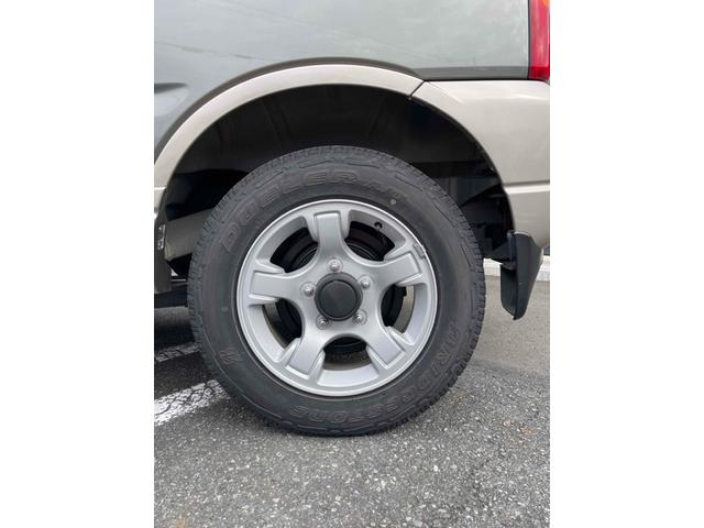 ジムニー ランドベンチャー　４ＷＤ　ナビ　キーレスエントリー　電動格納ミラー　シートヒーター　ＡＴ　ＡＢＳ　ＣＤ　ＭＤ　革シート　ルーフレール　アルミホイール　衝突安全ボディ　エアコン　パワーウィンドウ（28枚目）