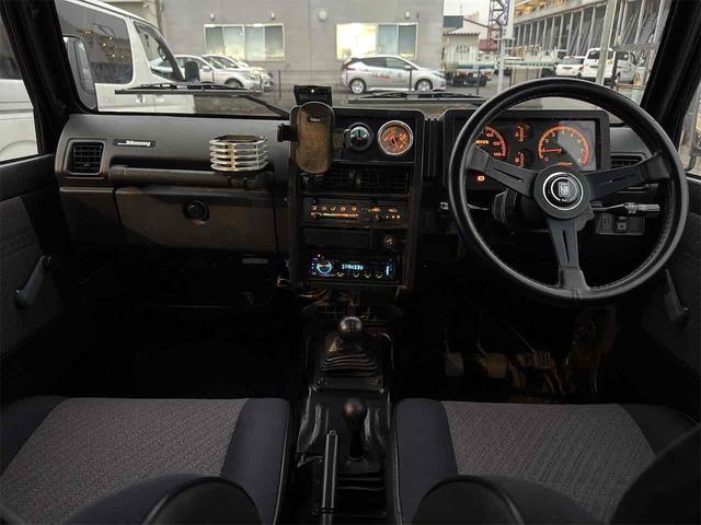 ジムニー ワイルドウインドリミテッド 4WD ETC ターボ MT CD アルミホイール エアコン(2枚目)