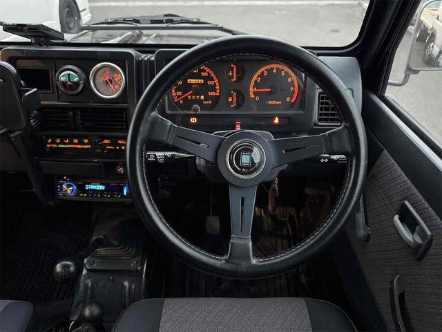 ジムニー ワイルドウインドリミテッド 4WD ETC ターボ MT CD アルミホイール エアコン(3枚目)