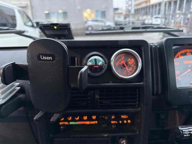 ジムニー ワイルドウインドリミテッド 4WD ETC ターボ MT CD アルミホイール エアコン(4枚目)