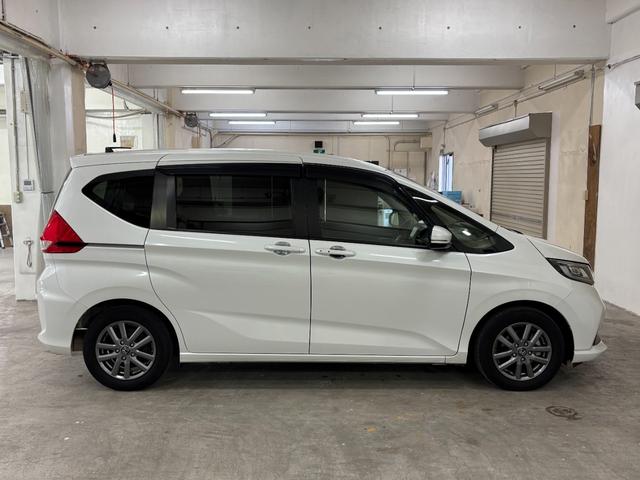 フリード Ｇ・ホンダセンシング　社外ナビフルセグＢカメラＥＴＣＬＥＤＡＷ　Ｆセグ　追突被害軽減ブレーキ　ｉストップ　Ｗエアバッグ　パワーウィンドウ　アクティブクルーズコントロール　スマートキ　カラーバックモニター　ＶＳＡ　エアコン（7枚目）