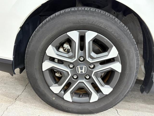 フリード＋ハイブリッド ハイブリッド・クロスターホンダセンシング　ナビフルセグＢカメラＥＴＣＬＥＤＡＷ　バックカメラ　シートヒーター　地デジフルセグ　両側電動ドア　サイドエアバッグ　ＬＥＤヘッドライト　スマートキー　横滑り防止装置　クルーズコントロール　ドラレコ（11枚目）