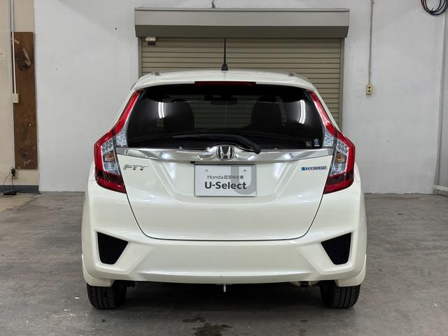 フィットハイブリッド Ｌパッケージ　ナビフルセグＢカメラＥＴＣＬＥＤＡＷ　ナビ＆ＴＶ　地デジフルセグＴＶ　ＵＳＢ　ＤＶＤ再生　バックカメラ　オートクルーズコントロール　ＥＳＣ　ＡＵＴＯエアコン　ＡＢＳ　運転席助手席エアバッグ　キーフリー（10枚目）