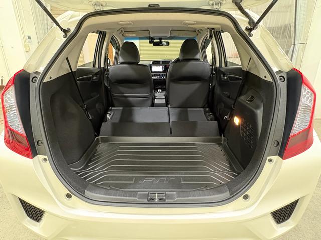 フィットハイブリッド Ｌパッケージ　ナビフルセグＢカメラＥＴＣＬＥＤＡＷ　ナビ＆ＴＶ　地デジフルセグＴＶ　ＵＳＢ　ＤＶＤ再生　バックカメラ　オートクルーズコントロール　ＥＳＣ　ＡＵＴＯエアコン　ＡＢＳ　運転席助手席エアバッグ　キーフリー（32枚目）