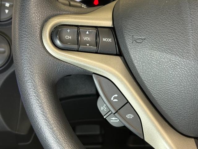 フィットハイブリッド ベースグレード　ナビワンセグＢカメラＥＴＣ　運転席助手席エアバック　ＨＤＤナビ　Ｃコントロール　キーレスエントリーキー　パワーウィンドウ　ＤＶＤ再生　バックモニター　ＡＵＴＯエアコン　ＡＢＳ　ＰＳ　運転席エアバック（20枚目）