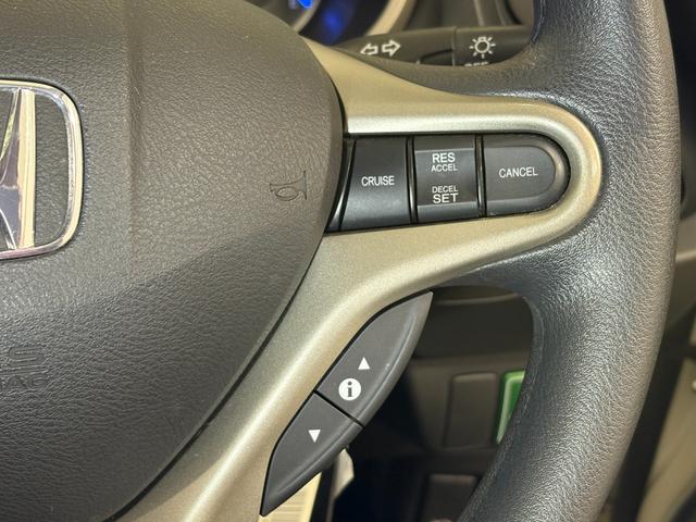 フィットハイブリッド ベースグレード　ナビワンセグＢカメラＥＴＣ　運転席助手席エアバック　ＨＤＤナビ　Ｃコントロール　キーレスエントリーキー　パワーウィンドウ　ＤＶＤ再生　バックモニター　ＡＵＴＯエアコン　ＡＢＳ　ＰＳ　運転席エアバック（21枚目）