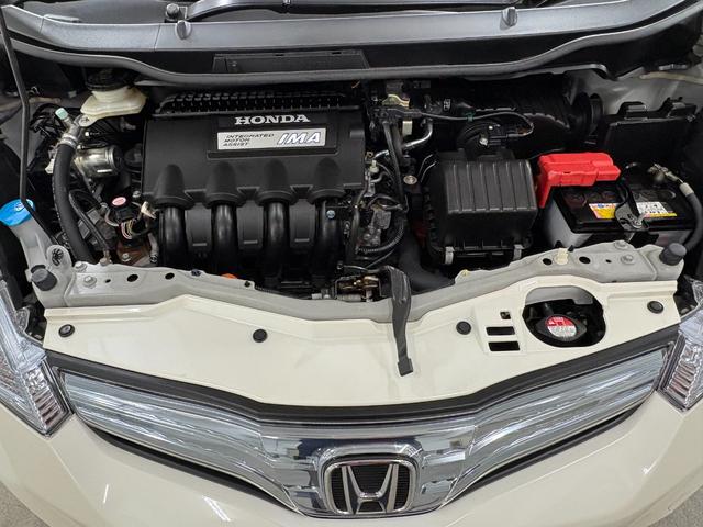 フィットハイブリッド ベースグレード　ナビワンセグＢカメラＥＴＣ　運転席助手席エアバック　ＨＤＤナビ　Ｃコントロール　キーレスエントリーキー　パワーウィンドウ　ＤＶＤ再生　バックモニター　ＡＵＴＯエアコン　ＡＢＳ　ＰＳ　運転席エアバック（33枚目）