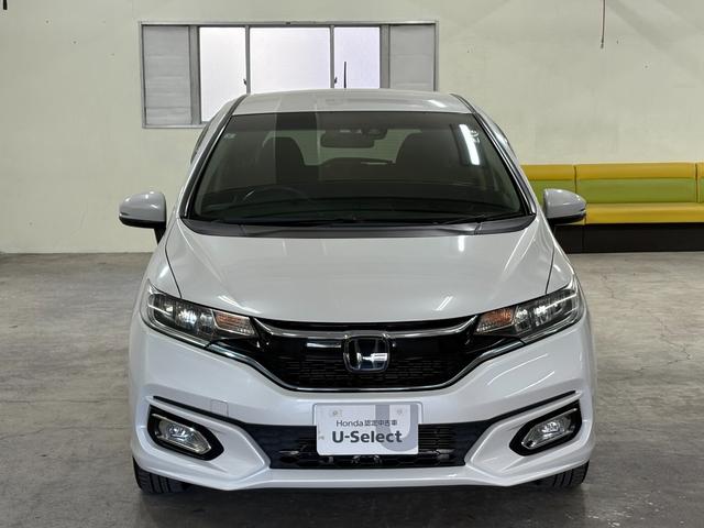 フィットハイブリッド Ｌホンダセンシング　ナビフルセグＢカメラＥＴＣＬＥＤ　軽減ブレーキ　Ｒカメ　サイドＳＲＳ　横滑り防止　ドライブレコーダー　フルセグテレビ　ナビＴＶ　パワーステアリング　オートクルーズ　ＥＴＣ車載器　ＤＶＤ再生　ＡＢＳ（5枚目）