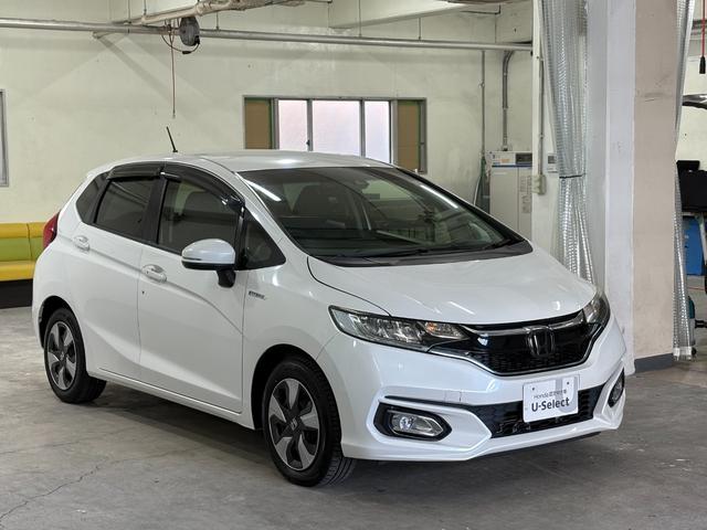 フィットハイブリッド Ｌホンダセンシング　ナビフルセグＢカメラＥＴＣＬＥＤ　軽減ブレーキ　Ｒカメ　サイドＳＲＳ　横滑り防止　ドライブレコーダー　フルセグテレビ　ナビＴＶ　パワーステアリング　オートクルーズ　ＥＴＣ車載器　ＤＶＤ再生　ＡＢＳ（6枚目）