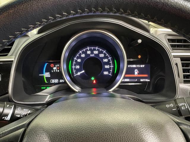 フィットハイブリッド Ｌホンダセンシング　ナビフルセグＢカメラＥＴＣＬＥＤ　軽減ブレーキ　Ｒカメ　サイドＳＲＳ　横滑り防止　ドライブレコーダー　フルセグテレビ　ナビＴＶ　パワーステアリング　オートクルーズ　ＥＴＣ車載器　ＤＶＤ再生　ＡＢＳ（15枚目）