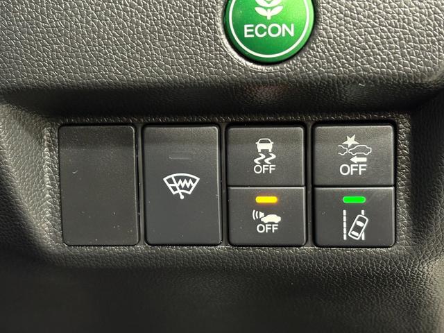 フィットハイブリッド Ｌホンダセンシング　ナビフルセグＢカメラＥＴＣＬＥＤ　軽減ブレーキ　Ｒカメ　サイドＳＲＳ　横滑り防止　ドライブレコーダー　フルセグテレビ　ナビＴＶ　パワーステアリング　オートクルーズ　ＥＴＣ車載器　ＤＶＤ再生　ＡＢＳ（22枚目）