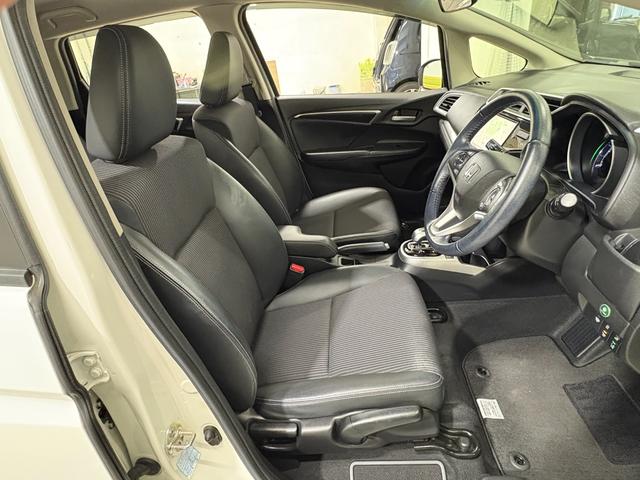 フィットハイブリッド Ｌホンダセンシング　ナビフルセグＢカメラＥＴＣＬＥＤ　軽減ブレーキ　Ｒカメ　サイドＳＲＳ　横滑り防止　ドライブレコーダー　フルセグテレビ　ナビＴＶ　パワーステアリング　オートクルーズ　ＥＴＣ車載器　ＤＶＤ再生　ＡＢＳ（28枚目）