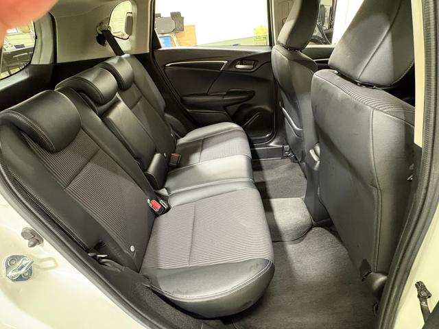 フィットハイブリッド Ｌホンダセンシング　ナビフルセグＢカメラＥＴＣＬＥＤ　軽減ブレーキ　Ｒカメ　サイドＳＲＳ　横滑り防止　ドライブレコーダー　フルセグテレビ　ナビＴＶ　パワーステアリング　オートクルーズ　ＥＴＣ車載器　ＤＶＤ再生　ＡＢＳ（29枚目）