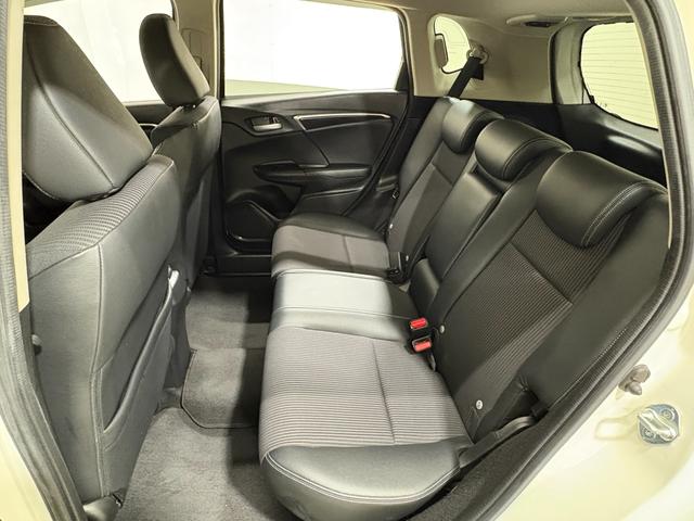 フィットハイブリッド Ｌホンダセンシング　ナビフルセグＢカメラＥＴＣＬＥＤ　軽減ブレーキ　Ｒカメ　サイドＳＲＳ　横滑り防止　ドライブレコーダー　フルセグテレビ　ナビＴＶ　パワーステアリング　オートクルーズ　ＥＴＣ車載器　ＤＶＤ再生　ＡＢＳ（32枚目）