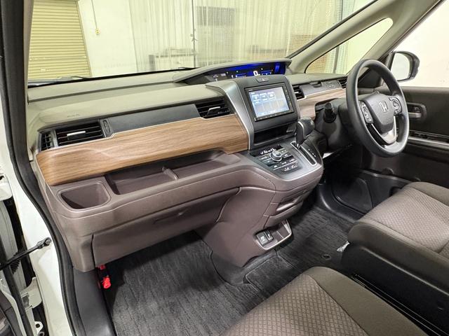 フリード Ｇ・ホンダセンシング　ナビＢカメラＥＴＣＬＥＤ　スマートキーＰスタート　ＵＳＢ入力　横滑防止装置　ＬＥＤランプ　リアカメ　クルコン　Ｄレコ　パワーウインド　エアバック　三列シート　ＥＴＣ装備　エアコン　ＡＢＳ　アイストップ（32枚目）