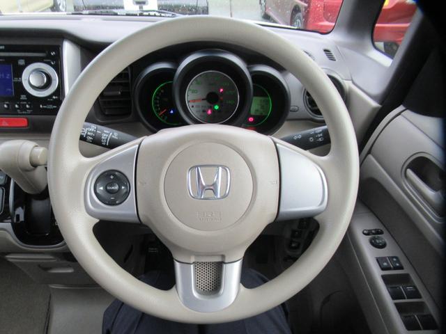 Ｎ－ＢＯＸ Ｇ・Ｌパッケージ　ＣＤオーディオ　片側電動スライド　イージードアクローザー　ハンドルリモコン　ブラウンシートカバー　キーレスプッシュスタート　電動格納ミラー　オートエアコン　アイドリングストップ　ワンオーナー（4枚目）