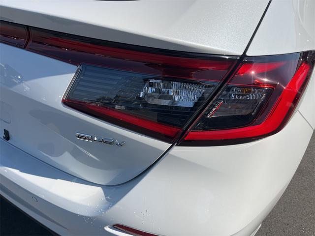 シビック ｅ：ＨＥＶ　ＥＸ　クリアランスソナー　レーンアシスト　オートクルーズコントロール　衝突被害軽減システム　バックカメラ　ナビ　アルミホイール　オートライト　ＬＥＤヘッドランプ　サンルーフ　ＣＶＴ　シートヒーター（30枚目）