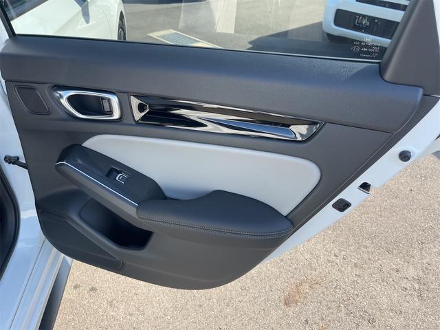 シビック ｅ：ＨＥＶ　ＥＸ　クリアランスソナー　レーンアシスト　オートクルーズコントロール　衝突被害軽減システム　バックカメラ　ナビ　アルミホイール　オートライト　ＬＥＤヘッドランプ　サンルーフ　ＣＶＴ　シートヒーター（65枚目）