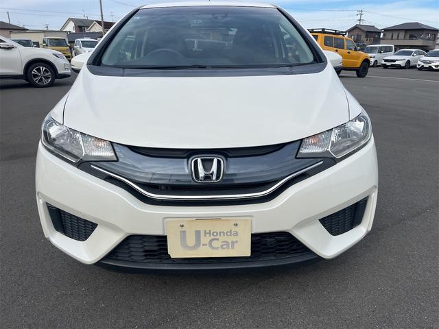 フィット １３Ｇ・Ｆパッケージ　ドライブレコーダー　ＥＴＣ　バックカメラ　ナビ　ＴＶ　衝突被害軽減システム　アルミホイール　スマートキー　アイドリングストップ　電動格納ミラー　チップアップシート　ＣＶＴ　盗難防止システム（12枚目）