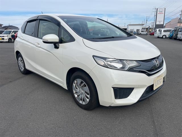 フィット １３Ｇ・Ｆパッケージ　ドライブレコーダー　ＥＴＣ　バックカメラ　ナビ　ＴＶ　衝突被害軽減システム　アルミホイール　スマートキー　アイドリングストップ　電動格納ミラー　チップアップシート　ＣＶＴ　盗難防止システム（13枚目）