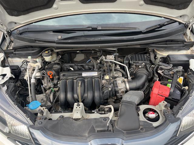 フィット １３Ｇ・Ｆパッケージ　ドライブレコーダー　ＥＴＣ　バックカメラ　ナビ　ＴＶ　衝突被害軽減システム　アルミホイール　スマートキー　アイドリングストップ　電動格納ミラー　チップアップシート　ＣＶＴ　盗難防止システム（19枚目）