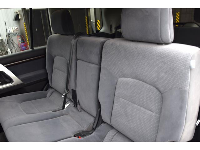 ランドクルーザー ＡＸ　ワンオーナー　サンルーフ　ルーフレール　ナビ　テレビ　Ｂｌｕｅｔｏｏｔｈ　バックカメラ　８人乗り　３列シート　禁煙車　ステアリングリモコン　ＨＩＤランプ　　木目調パネル　前後・左右独立オートエアコン（10枚目）