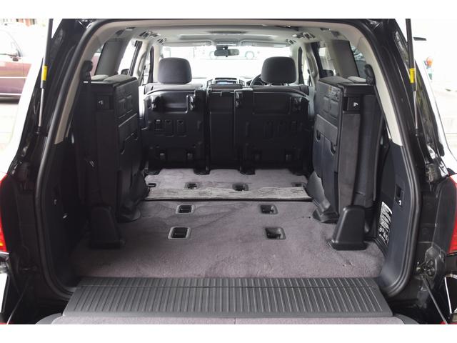 ランドクルーザー ＡＸ　ワンオーナー　サンルーフ　ルーフレール　ナビ　テレビ　Ｂｌｕｅｔｏｏｔｈ　バックカメラ　８人乗り　３列シート　禁煙車　ステアリングリモコン　ＨＩＤランプ　　木目調パネル　前後・左右独立オートエアコン（15枚目）