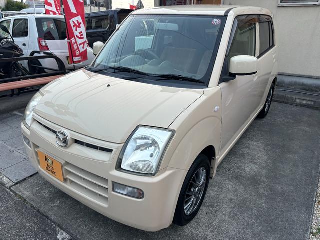 キャロル GII 車検 2年 付き ワンオーナー ナビ ワンセグ 5速マニュアル 5MT 13インチ社外アルミホイール 国産タイヤ 記録簿 キーレス 電動格納ドアミラー ドアバイザー フロアマット(3枚目)