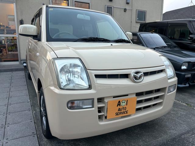 キャロル GII 車検 2年 付き ワンオーナー ナビ ワンセグ 5速マニュアル 5MT 13インチ社外アルミホイール 国産タイヤ 記録簿 キーレス 電動格納ドアミラー ドアバイザー フロアマット(4枚目)