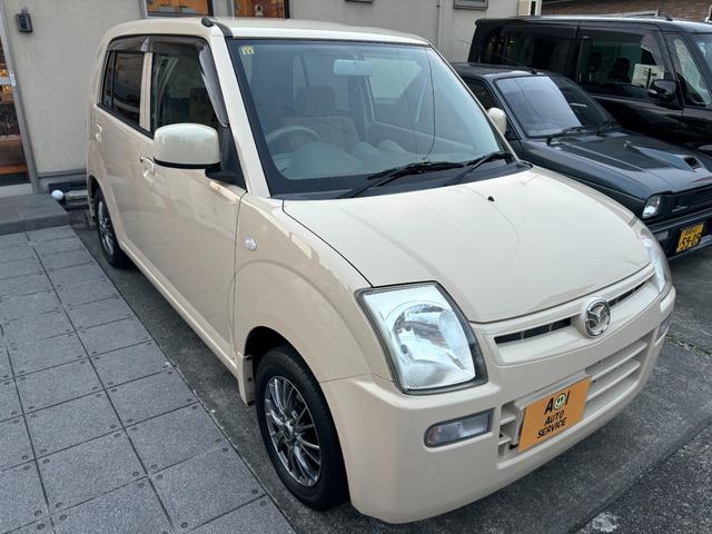 キャロル GII 車検 2年 付き ワンオーナー ナビ ワンセグ 5速マニュアル 5MT 13インチ社外アルミホイール 国産タイヤ 記録簿 キーレス 電動格納ドアミラー ドアバイザー フロアマット(5枚目)