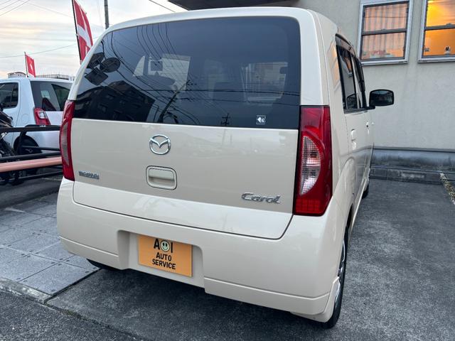 キャロル GII 車検 2年 付き ワンオーナー ナビ ワンセグ 5速マニュアル 5MT 13インチ社外アルミホイール 国産タイヤ 記録簿 キーレス 電動格納ドアミラー ドアバイザー フロアマット(9枚目)
