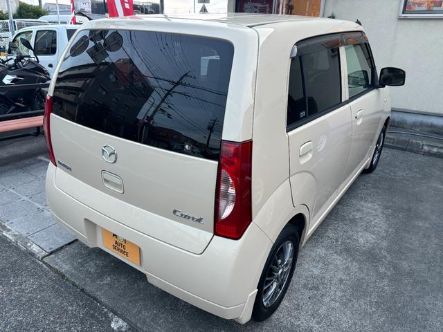 キャロル GII 車検 2年 付き ワンオーナー ナビ ワンセグ 5速マニュアル 5MT 13インチ社外アルミホイール 国産タイヤ 記録簿 キーレス 電動格納ドアミラー ドアバイザー フロアマット(10枚目)