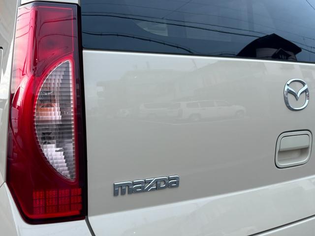 キャロル GII 車検 2年 付き ワンオーナー ナビ ワンセグ 5速マニュアル 5MT 13インチ社外アルミホイール 国産タイヤ 記録簿 キーレス 電動格納ドアミラー ドアバイザー フロアマット(14枚目)