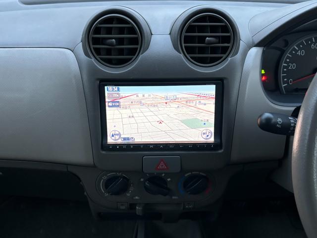 キャロル GII 車検 2年 付き ワンオーナー ナビ ワンセグ 5速マニュアル 5MT 13インチ社外アルミホイール 国産タイヤ 記録簿 キーレス 電動格納ドアミラー ドアバイザー フロアマット(21枚目)