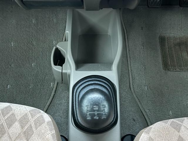 キャロル GII 車検 2年 付き ワンオーナー ナビ ワンセグ 5速マニュアル 5MT 13インチ社外アルミホイール 国産タイヤ 記録簿 キーレス 電動格納ドアミラー ドアバイザー フロアマット(23枚目)