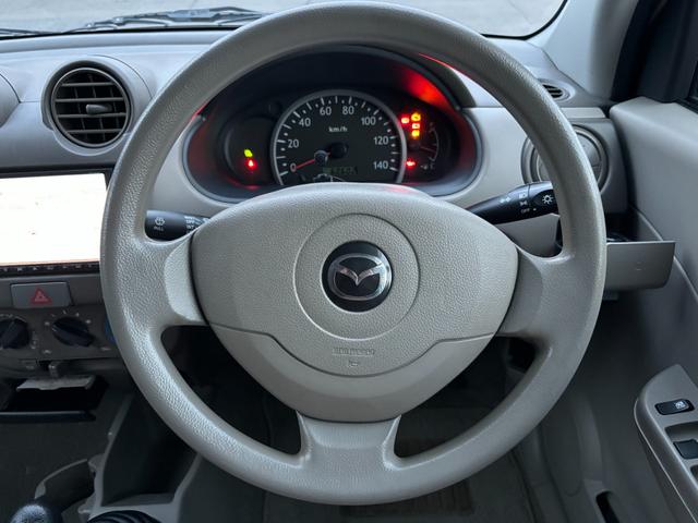 キャロル GII 車検 2年 付き ワンオーナー ナビ ワンセグ 5速マニュアル 5MT 13インチ社外アルミホイール 国産タイヤ 記録簿 キーレス 電動格納ドアミラー ドアバイザー フロアマット(26枚目)