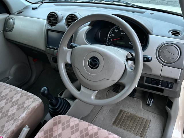キャロル GII 車検 2年 付き ワンオーナー ナビ ワンセグ 5速マニュアル 5MT 13インチ社外アルミホイール 国産タイヤ 記録簿 キーレス 電動格納ドアミラー ドアバイザー フロアマット(29枚目)