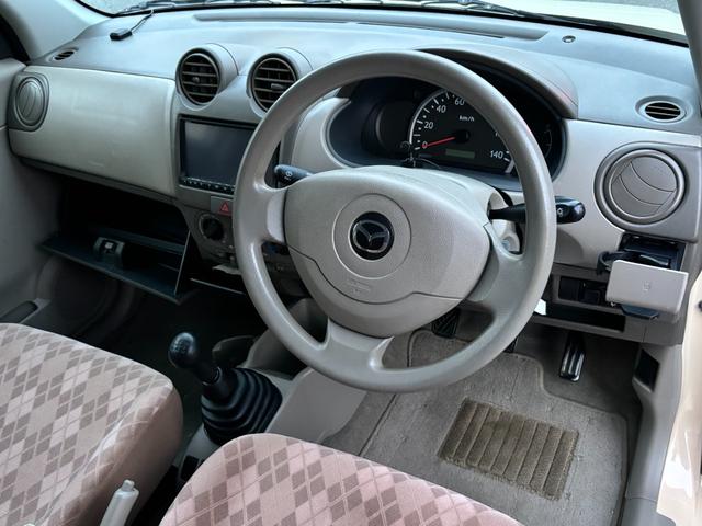 キャロル GII 車検 2年 付き ワンオーナー ナビ ワンセグ 5速マニュアル 5MT 13インチ社外アルミホイール 国産タイヤ 記録簿 キーレス 電動格納ドアミラー ドアバイザー フロアマット(30枚目)