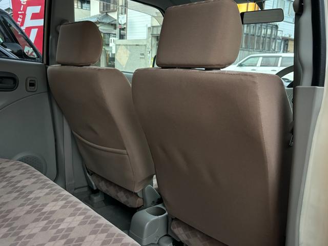 キャロル GII 車検 2年 付き ワンオーナー ナビ ワンセグ 5速マニュアル 5MT 13インチ社外アルミホイール 国産タイヤ 記録簿 キーレス 電動格納ドアミラー ドアバイザー フロアマット(35枚目)