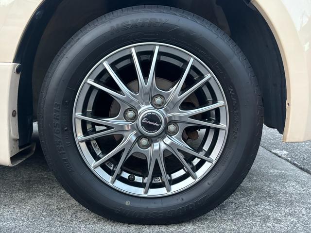 キャロル GII 車検 2年 付き ワンオーナー ナビ ワンセグ 5速マニュアル 5MT 13インチ社外アルミホイール 国産タイヤ 記録簿 キーレス 電動格納ドアミラー ドアバイザー フロアマット(46枚目)