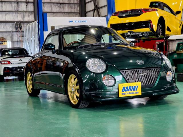コペン タンレザーエディション　４ＡＴ　タンレザーシート　純正フルエアロ　ＭＯＭＯウッドハンドル　ＭＩＮＩＬＩＴＥアルミホイール　ＳＨＯＷＡサスペンション　シートヒーター　ＥＴＣ　専門店整備済み　屋内展示車両（11枚目）