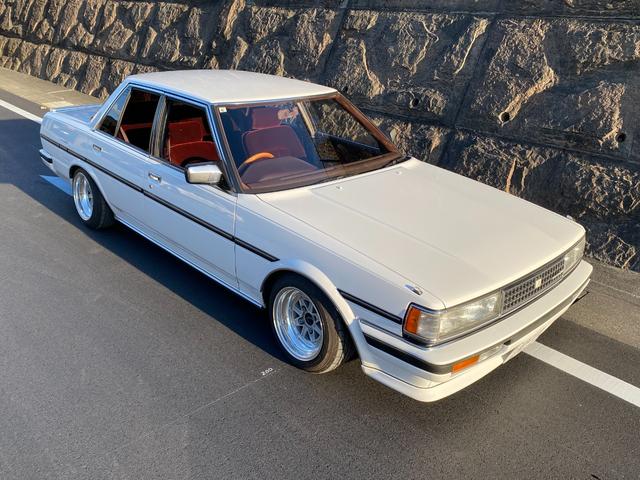 クレスタ スーパールーセント　ツインカム２４　後期型　赤内装　５速公認　車高調　ＳＳＲ１４インチマークＩＩＩ　Ｄ－ＣＡＲＳオリジナルマフラー　フロントスポイラー　リヤスポイラー　デジパネ　ＫＥＮＷＯＯＤ当時物デッキ　社外ステアリング　水中花（8枚目）