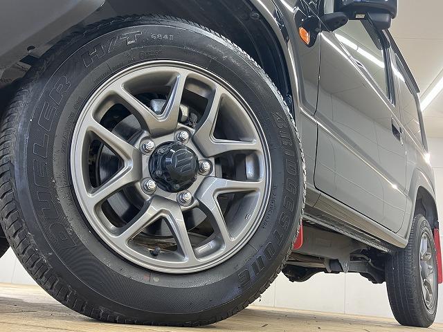 ジムニー ＸＣ　純正８型ナビ／クルーズコントロール／クリアランスソナー／バックカメラ／スズキセーフティーサポート／車線逸脱／ＥＴＣ／ＬＥＤヘッド／フォグ／マッドフラップ／純正１６インチアルミホイール／スマートキー（72枚目）