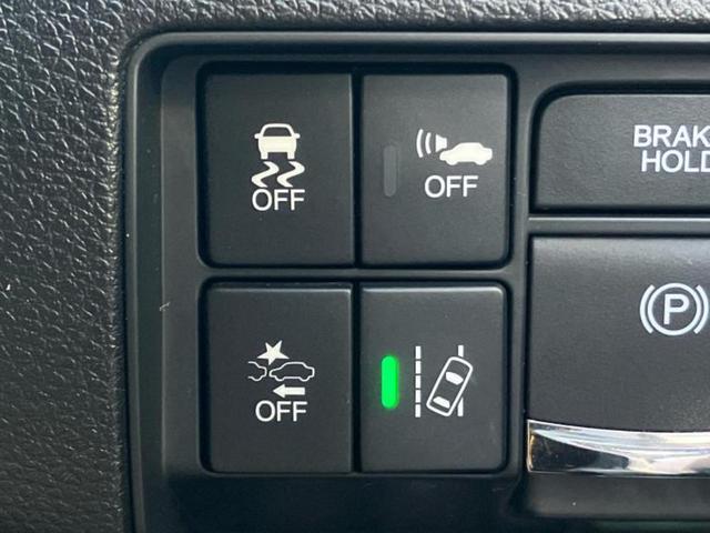 オデッセイハイブリッド ハイブリッドアブソルート・ＥＸホンダセンシング　保証書／純正　９インチ　ＳＤナビ／ホンダセンシング／両側電動スライドドア／シートヒーター　前席／マルチビューカメラシステム／車線逸脱防止支援システム／シート　ハーフレザー　衝突被害軽減システム　記録簿（39枚目）