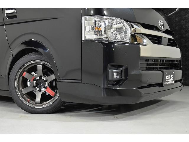 ハイエースバン スーパーGL ダークプライムII パノラミックビューモニター/14段ショックアブソーバー/スタビライザー/天井スピーカー/Aピラースピーカー/2インチローダウン/ボルクレーシング/エンジンルームカバー(10枚目)