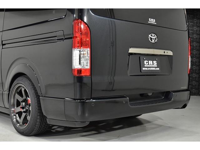 ハイエースバン スーパーGL ダークプライムII パノラミックビューモニター/14段ショックアブソーバー/スタビライザー/天井スピーカー/Aピラースピーカー/2インチローダウン/ボルクレーシング/エンジンルームカバー(26枚目)